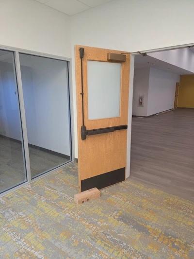 Fire door inspection and repair service ensuring proper closing and fire safety compliance