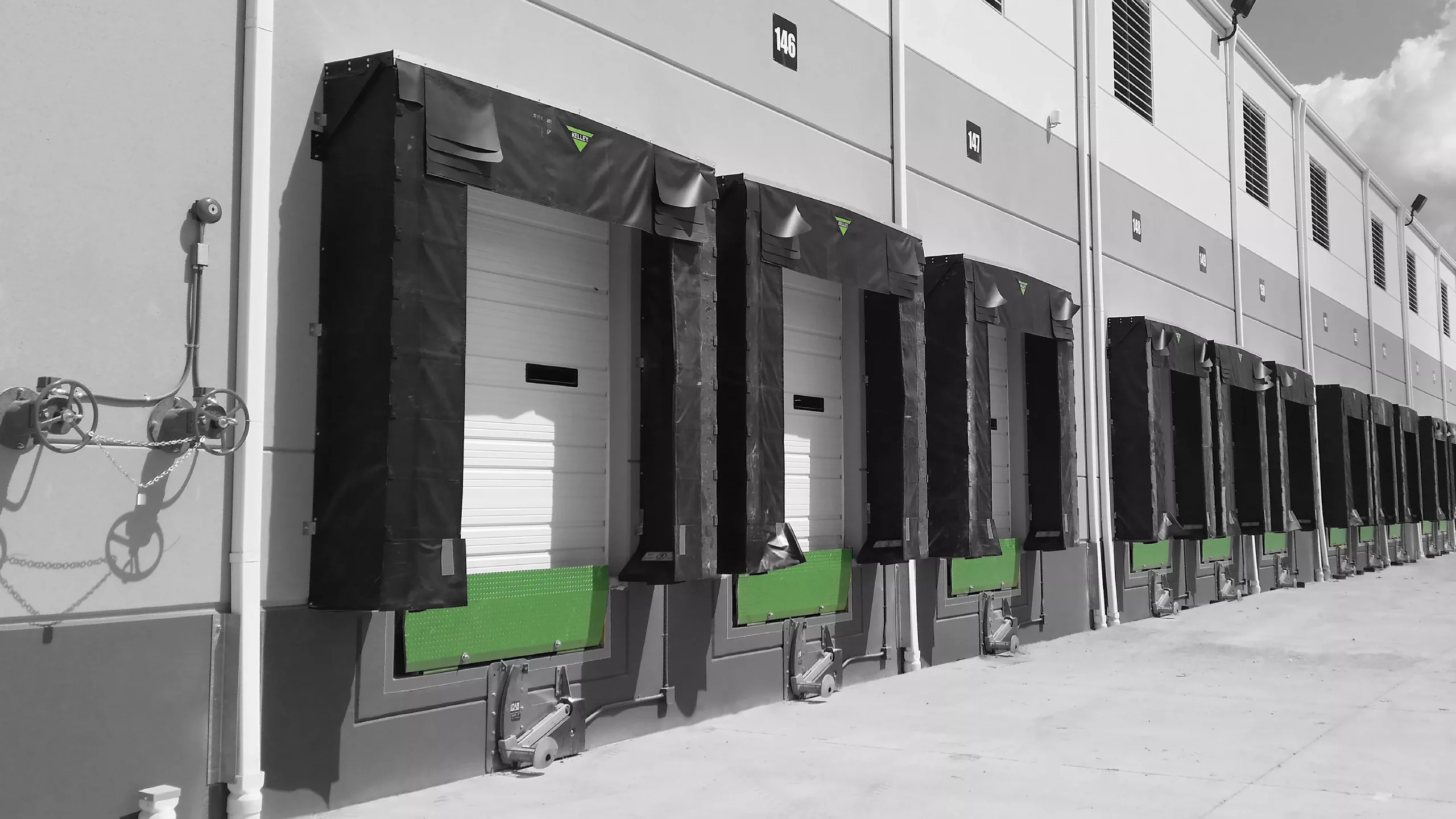 Professional installation of heavy-duty hydraulic dock levelers and vehicle restraints